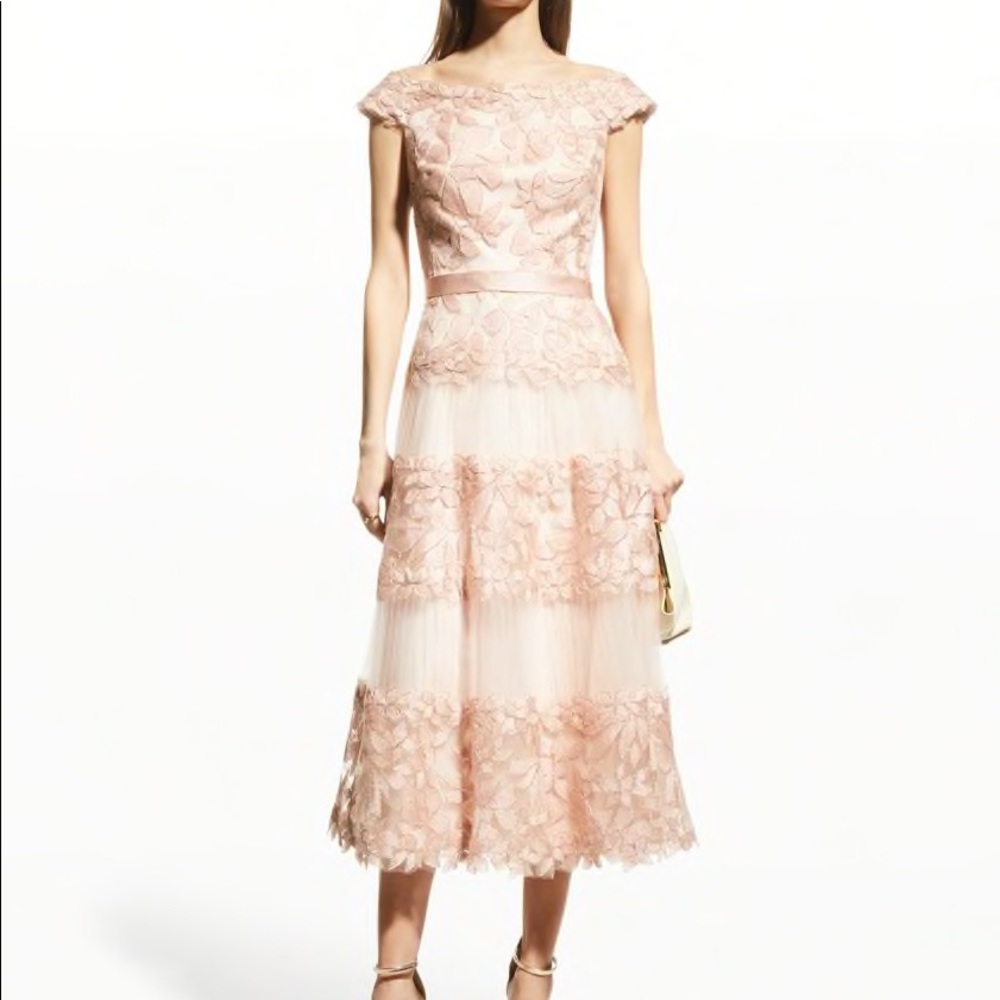 Tadashi Shoji paneled lace cocktail dress with nude-tone underlay.